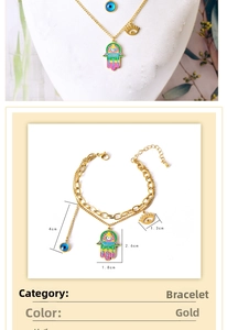 Detail of gold Hamsa hand and Evil Eye jewelry set with precise size measurements