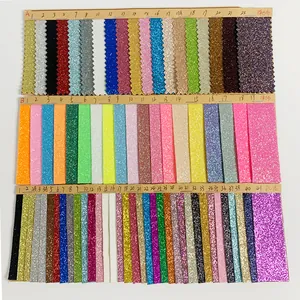 Detailed color swatches of glitter fabric and PU leather for birthday party sashes