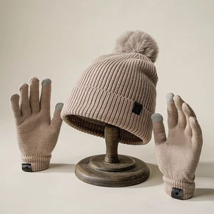 Knit beanie with faux fur pom and touchscreen gloves set in mocha brown color