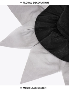 Close-up of gothic witch hat featuring floral decoration and mesh lace design detail