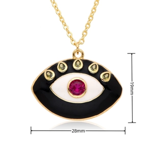 Detailed view of evil eye pendant with measurements 28mm by 19mm in gold and red
