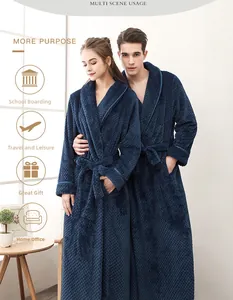 Detailed close-up of navy blue thickened fleece bathrobe texture with shawl collar and waist tie