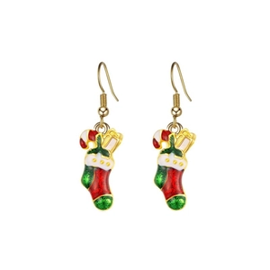 Detailed shot of Christmas stocking earrings with candy cane and gift box charms