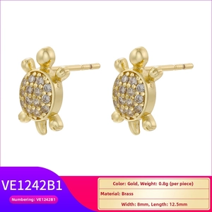 Detail of 8mm gold-plated brass turtle stud earrings with white cubic zirconia stones