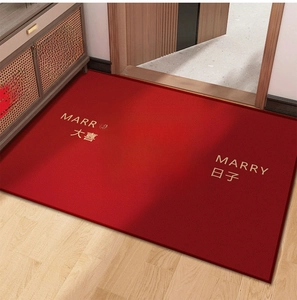 Close-up of red wedding floor mat featuring golden double happiness and non-slip texture
