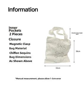 Detail view of white chiffon sequin tote bag with silver bows and dimensions text