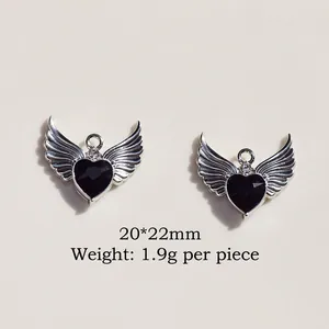 Detail of 20x22mm silver alloy wing pendant with black heart for DIY Y2K jewelry
