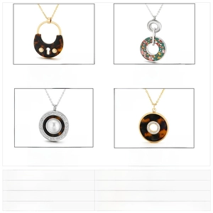 Size chart for stainless steel pendant necklaces showing dimensions, weight, and materials