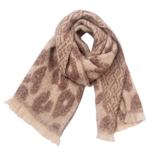 Close-up of leopard print scarf with short tassels in brown and beige colors