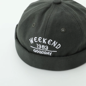 Dark grey-green miki hat for kids with Weekend 1983 embroidery and retro brimless design