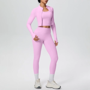 Detailed view of women's 3-piece pink yoga set with zip-up jacket and high waist pants