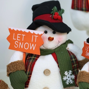Christmas snowman plush doll with Let It Snow wooden sign for festive holiday decor