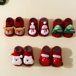 Christmas baby floor socks with anti-slip soles featuring reindeer and snowman 3D designs