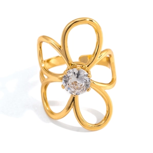 Macro shot of gold-plated 18K flower ring with a large center zircon and open band