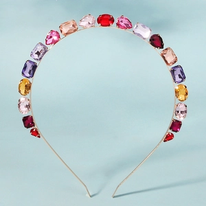 Close-up of headband featuring multicolored rhinestones in wheat-ear style patterns