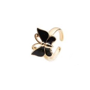 Adjustable golden open ring with black enamel butterfly design on a clean white background