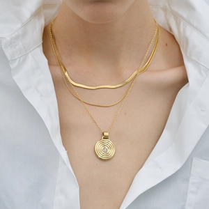 Layered gold titanium necklace set with flat snake chain and crystal round pendant