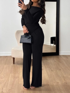 Elegant black long sleeve slim fit jumpsuit for women with long pants for a formal style
