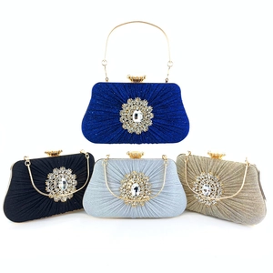 Elegant pleated evening clutch bags with crystal rhinestones in blue, black, silver, and gold