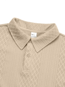Macro shot of khaki knit polo shirt collar with size L label and button details