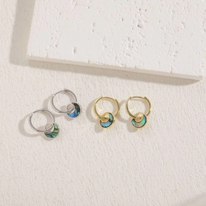 Elegant abalone shell hoop earrings in gold and silver finish with bohemian charms