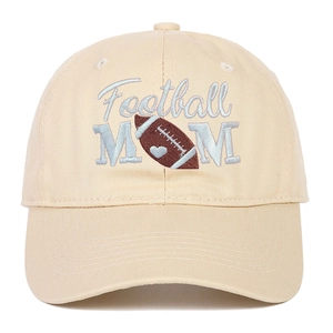 Close-up of Football MOM embroidery with blue heart on beige cotton baseball cap