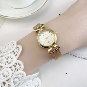 Vintage gold quartz watch for women with mesh metal strap and elegant rhinestone markers