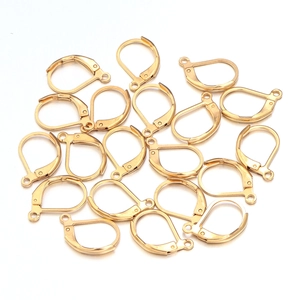 Close-up of golden leverback earring hooks for DIY jewelry making and craft supplies