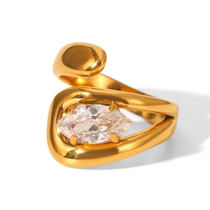 Detail of gold open ring featuring a large marquise cut zircon on a sleek band