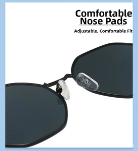 Close-up of adjustable silicone nose pads on black polygonal sunglasses frame for comfort