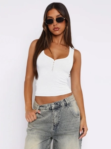 Detailed close-up of white ribbed tank top with buttoned Henley neck and slim fit style