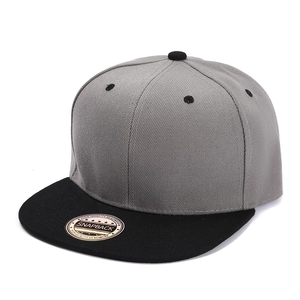 Detail of gray camo flat brim baseball cap with black visor and snapback sticker