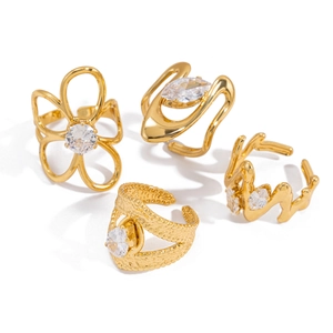 Set of four gold-plated stainless steel adjustable rings with sparkling zircon accents