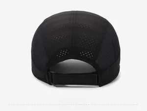 Detailed back view of breathable black mesh cap with adjustable velcro strap closure