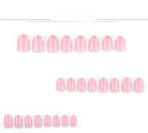 Détail des faux ongles French manucure rose nude et blanc en plusieurs tailles