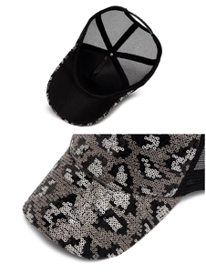 Detail of sequin leopard pattern and breathable mesh on summer baseball cap