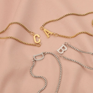 Minimalist stainless steel letter pendants on box chain bracelets in gold and silver finish