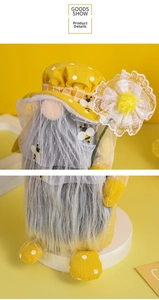 Detailed view of bee festival gnome plush doll with lace flower and yellow polka dot hat
