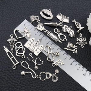 Assorted silver medical charms set for DIY jewelry with stethoscope and nurse motifs