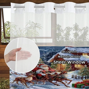 Detail of sheer white upper mesh and festive Santa reindeer print on the shower curtain