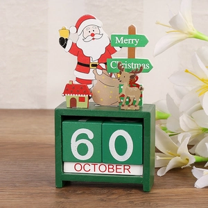 Detailed view of green wooden Christmas countdown calendar with Santa and reindeer