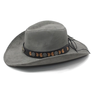 Detail of grey suede cowboy hat featuring black leather band and metal star rivets