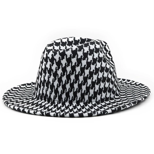 Close-up of the classic black and white houndstooth wool fedora with a flat brim