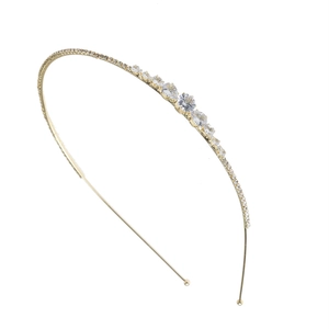 Elegant gold metal headband featuring sparkling clear rhinestones for women's hair fashion