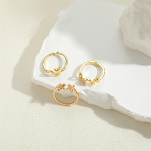 Three-piece set of minimalist vintage gold flower rings with love letter and crescent design