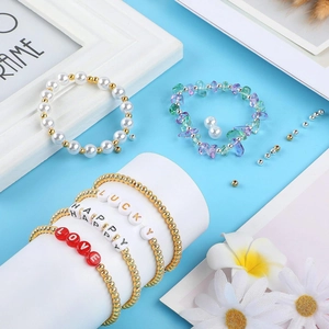 Detailed set of 5 colorful beaded bracelets with gold beads and LUCKY HAPPY LOVE letters