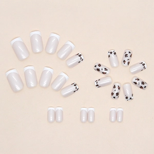 Leopard print and French tip press-on nails with glossy finish in nude pink and brown
