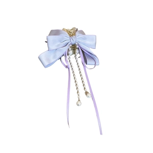 Elegant lavender silk bow claw clip with gold metal and dangling pearl tassels for women