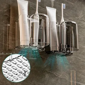 Wall-mounted transparent toothbrush holder with two cups for bathroom organization