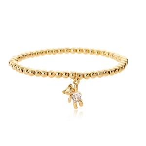 Gold beaded bracelet with a cute bear pendant featuring a clear zircon inlay on white base
